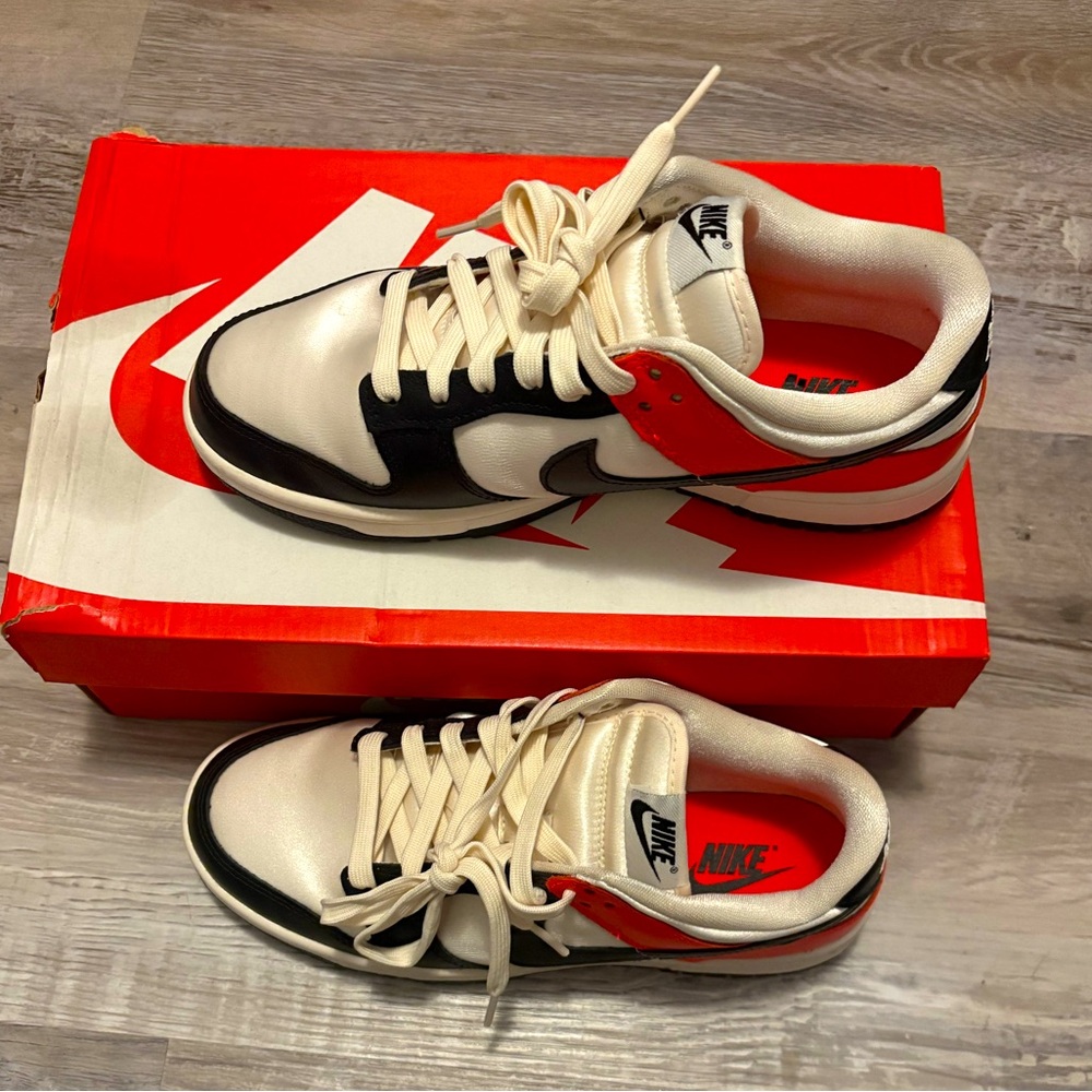 Nike Cream and Black Sneakers with Red Accents